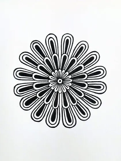 A simple, bold floral design. The clean, repeating loops create a dynamic and modern-looking mandala.