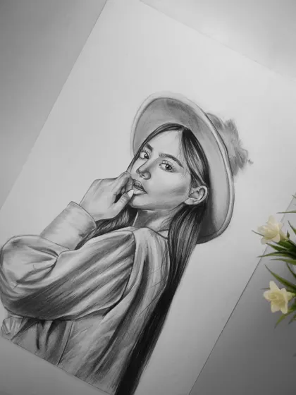 My first portrait sketch of 2024, a woman in a hat. I used graphite on ivory paper to create a soft, classic look, focusing on the gentle shadows and the texture of her clothing.