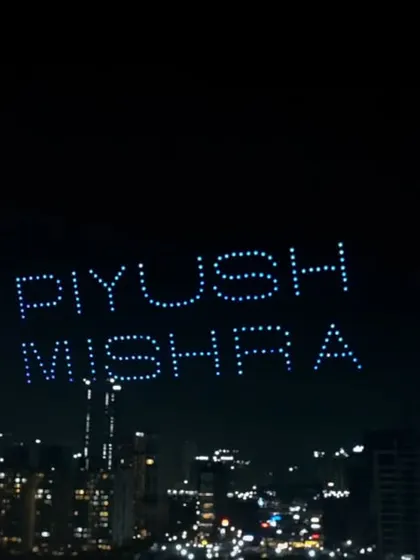 A tribute to the artist himself, with 'Piyush Mishra' spelled out in the sky. This formation was a highlight of our show for the Ballimaaraan concert, honoring the man behind the music.
