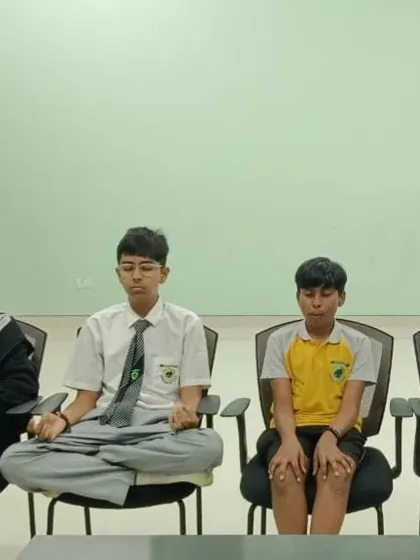 A moment of calm and focus. Meditation is a core part of our training, helping our young shooters develop the mental stillness required to perform under the immense pressure of competition.
