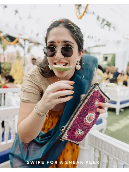 A fun and quirky shot of a guest enjoying the festivities, perfectly capturing the playful vibe of the event.