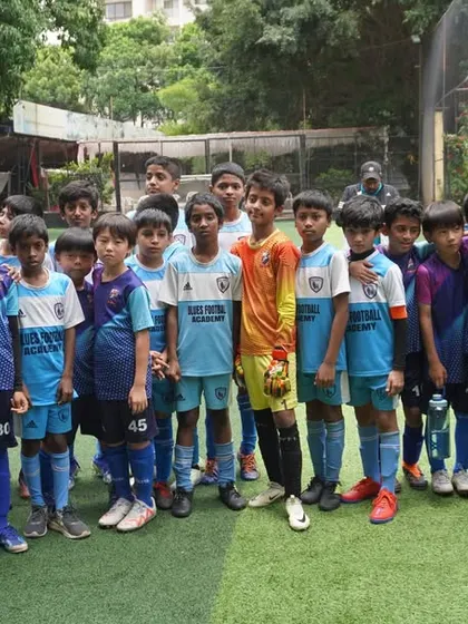 A large group of our youth players gathered for a team photo, representing multiple age groups.