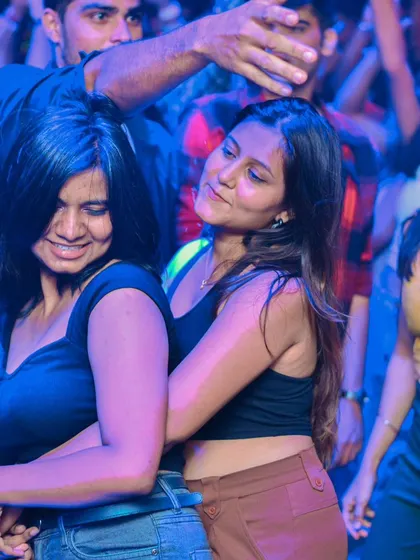 Two friends dancing together, completely absorbed in the music. My sets are perfect for letting loose and enjoying the moment.