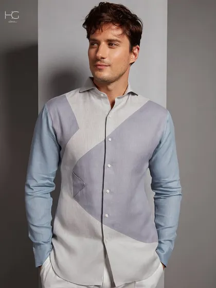 A different angle of the bespoke color-blocked shirt, showing how the design flows from front to back for a cohesive and modern look.