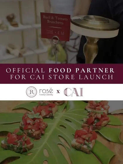 A promotional image for our partnership with the CAI store launch, featuring our classic Basil and Tomato Bruschetta. We are proud to be the official food partner for exclusive corporate events.