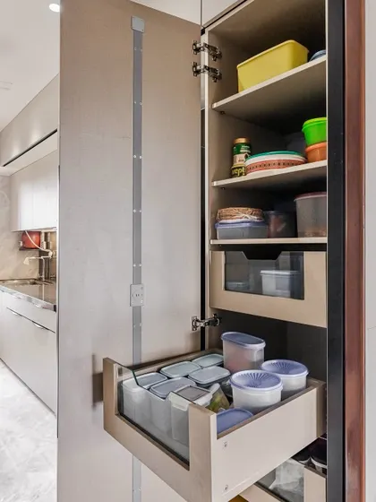 Our pantry units feature a combination of shelves and pull-out drawers, allowing for versatile storage of all your dry goods and groceries.
