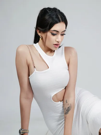 A softer, more introspective shot in the white dress. This image shows emotional range, an important quality for actors and commercial models.