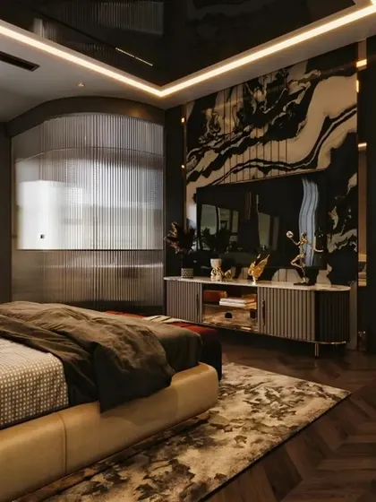 A luxurious and dramatic master bedroom featuring a black marble accent wall and a reflective ceiling. The use of dark tones, rich textures, and custom lighting creates an intensely moody and high-end atmosphere.