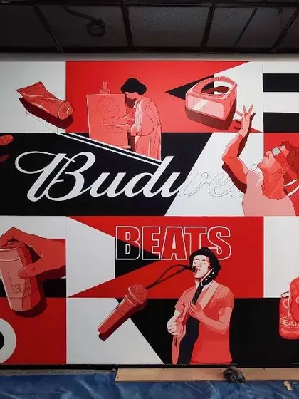 For Budweiser Beats, we created this graphic mural using their iconic red, black, and white color palette. The design features a collage of musical and lifestyle elements, capturing the brand's energetic and industrial vibe.