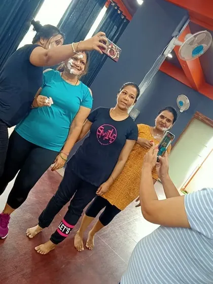 Capturing the fun moments during our in-studio birthday party. Everyone gets in on the action, taking photos and making memories.