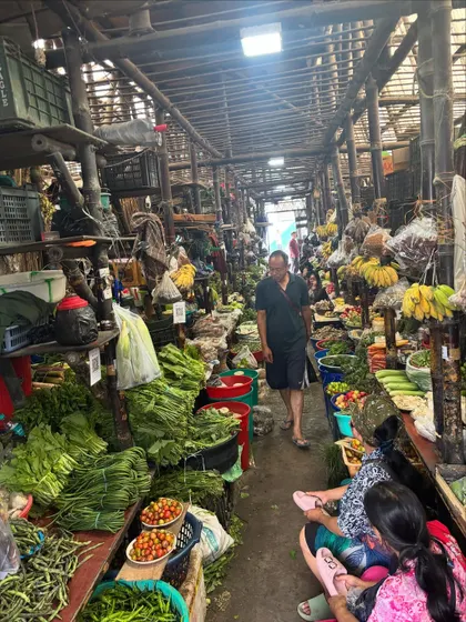 An overview of a bustling indoor market in Nagaland. This is where the stories of our food begin, with farmers from faraway villages bringing their harvest to sell.