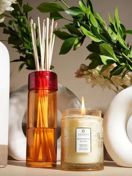 The beautiful pairing of our Rajnigandha Blooms candle and reed diffuser. The warm, floral scent is perfect for creating a welcoming and elegant atmosphere in any room.
