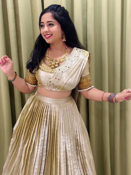 A playful pose that shows the fun side of wearing traditional clothes. They are meant to be enjoyed.