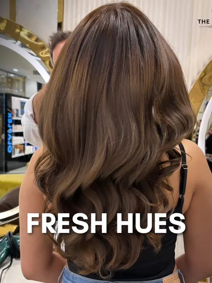 Fresh hues for a fresh look. This is a beautiful example of how expertly placed highlights can illuminate long hair, creating depth and a gorgeous, flowing style.