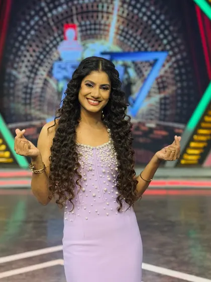 Sending some love to the audience and contestants.