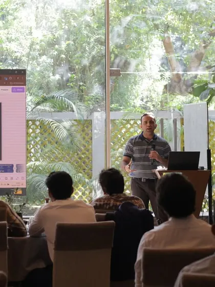 Another speaker at the corporate workshop, with our large windows providing beautiful natural light.