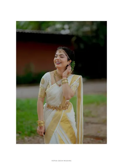 An elegant portrait of the bride, her joyful laugh captured in a timeless, beautifully framed shot.