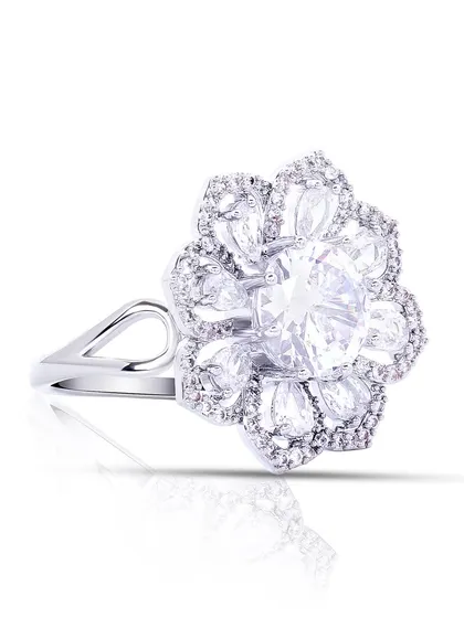 A side view of the flower-shaped diamond ring, giving a sense of its height and profile.
