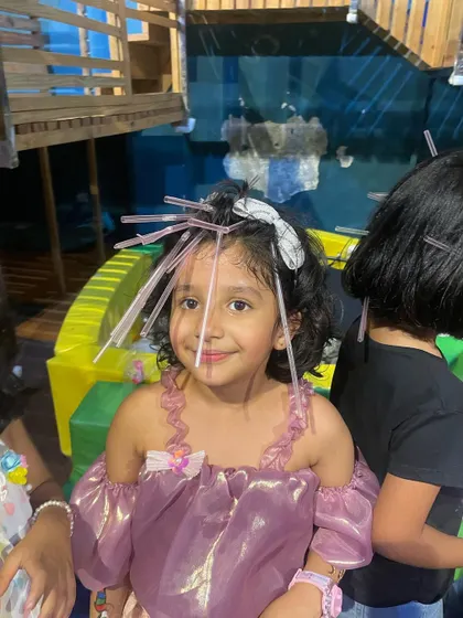 This hilarious game involves sticking straws in your hair. It's silly, simple, and always results in a lot of laughter and funny pictures.