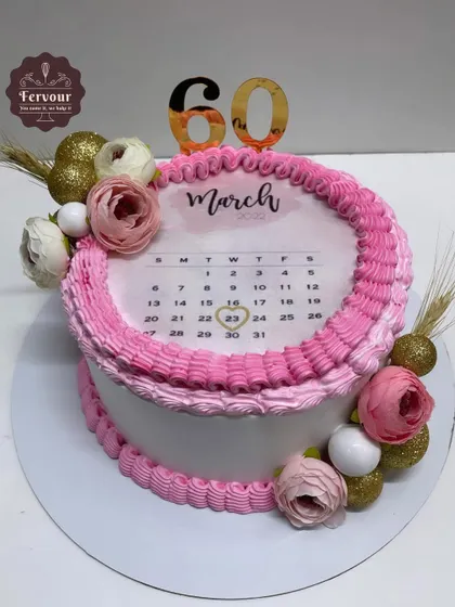 A fun take on the burn-away trend, this cake was designed for a 60th birthday. The top layer is an edible calendar page, which, when lit, reveals a hidden photo underneath, making for a memorable surprise.