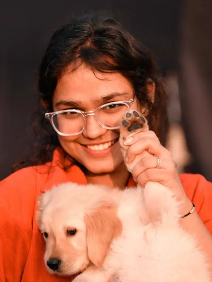 A tiny paw held in a loving hand. This is what it's all about. Moments like these with a new puppy are so fleeting, and I feel so lucky to be able to capture this simple, powerful gesture of connection. It’s a memory to hold onto forever.