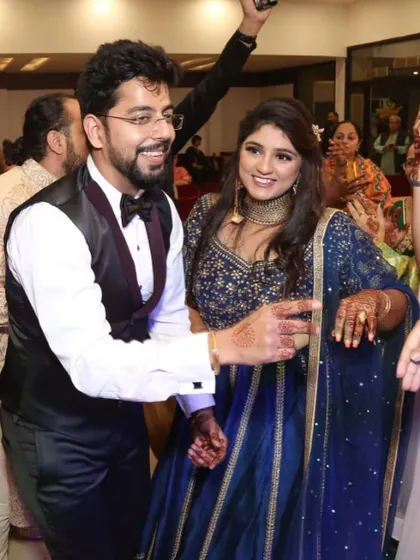 Bright and beautiful in blue! This happy bride chose a Pooja Peshoria lehenga for her big day, living her dream of wearing a designer outfit.