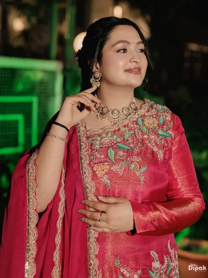 A close-up of Ishita's beautiful makeup for the Mata ki Chowki. The look is soft, fresh, and enhances her natural radiance.
