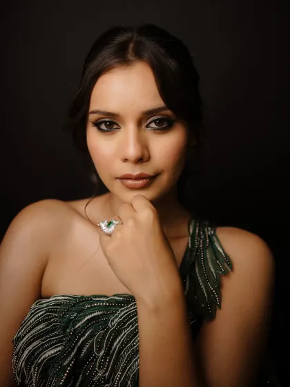 The shimmery, smokey eye is the star of this look. It's a great way to add drama for an evening event while keeping the rest of the makeup soft and balanced.