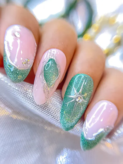 This Navratri design in green and pink features cat-eye effects, silver chrome details, and delicate crystal placements, inspired by Goddess Skandamata.