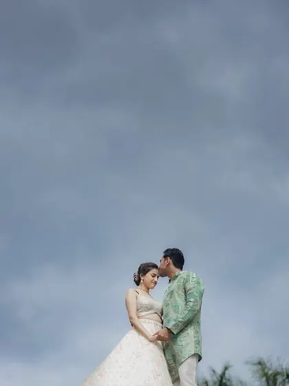 Using the vast, cloudy sky as a backdrop, this image creates a sense of serene grandeur. It’s a simple yet powerful composition that makes your connection the central focus against the expanse of nature.