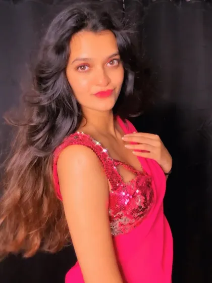 A soft, glamorous portrait in my modern pink saree. Fashion and styling are a huge part of my artistic expression.