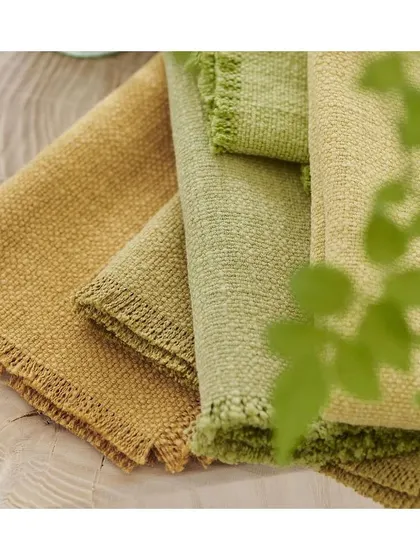 Stylish, modern, and versatile, these plain fabrics in earthy greens and ochres are perfect for creating chic interiors. They can be paired with prints or used alone for a sophisticated monochrome space.