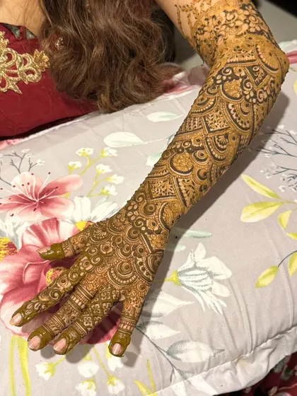 This is a detailed view of my intricate bridal henna work. Each design is unique, combining traditional patterns like paisleys and mandalas with fine-line fillers to create a stunning, full-coverage look for your special day.