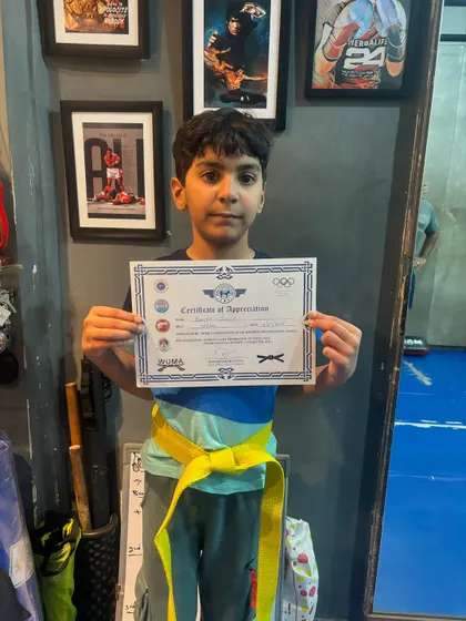 It all starts with the first step. This young champion just cleared his Level One kickboxing exam and earned his yellow belt. We build discipline and confidence from a young age.