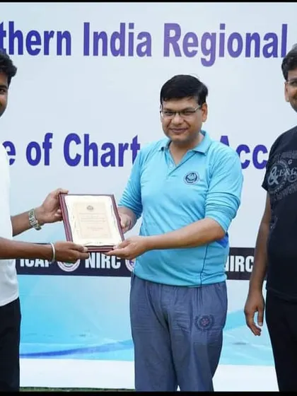 Receiving a certificate of appreciation from the Northern India Regional Council of the Institute of Chartered Accountants for conducting a yoga session.