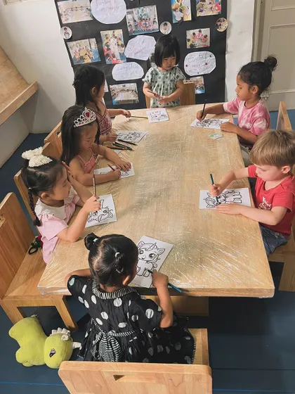 Another view of our little artists at work. I provide a variety of coloring and writing activities to keep them engaged and build their readiness for kindergarten.