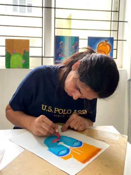 Another student from our CFA course working with oil pastels. The small class size allows for plenty of interaction and guidance.