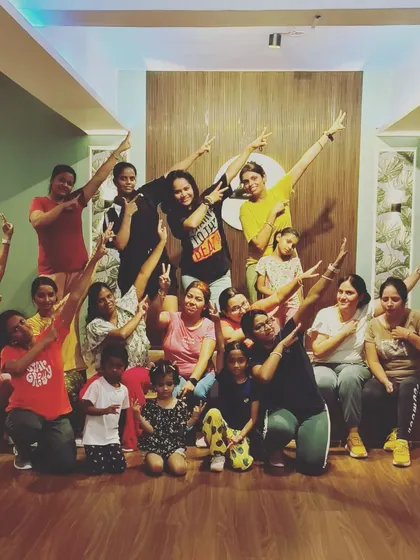 Another fun pose with the group. We are more than just a class; we are a team that supports and celebrates together.