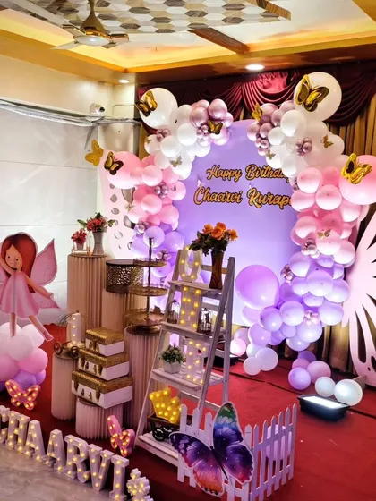 A whimsical fairy and butterfly theme for Chaarvi's birthday.