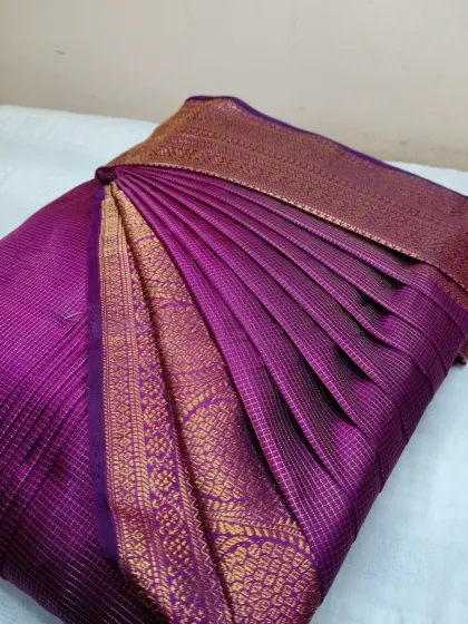 This deep purple saree with a gold border is ready to go. I offer my service in both Jayanagar and Mathikere for your convenience.