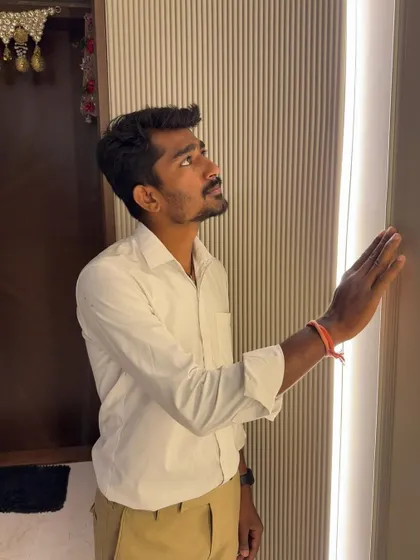 Here I am, checking the finish on the fluted wall panels and the profile lighting in a newly designed foyer. Every detail is inspected to ensure perfection.