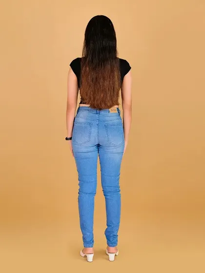 A standard back view for a model's portfolio. I ensure the skin is prepped and smooth for these essential shots.