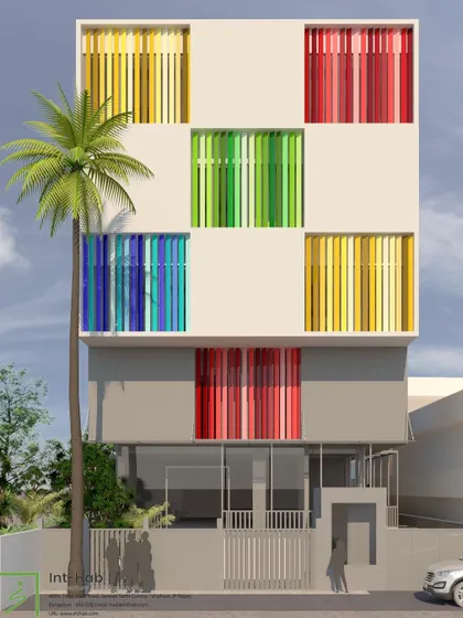 A direct front elevation of the R&D center concept. The voids with colorful fins are designed to be functional, allowing for machinery to be transported to each floor, while also representing the company's vibrant business.