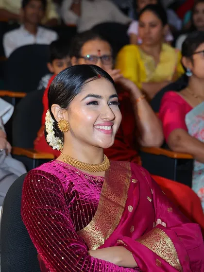A candid shot of our special guest, Ragini Prajwal, enjoying the performances at Arnav Habba 2025.