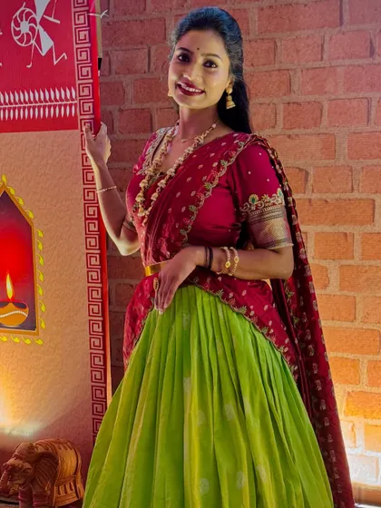 The outfit looks perfect against this rustic, village-themed backdrop. The colours pop and create a beautiful picture.