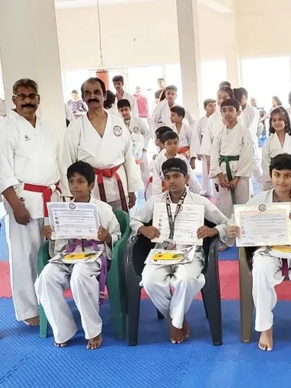 Awarding cash prizes to our state-level championship winners, with Grandmaster Soke. Shrinivas in attendance.