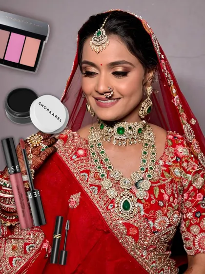 Get the look. This image breaks down the key products used to create this stunning bridal makeup, including Shopaarel gel eyeliner, Sephora lipstick, Anastasia Beverly Hills blush, and YSL mascara.