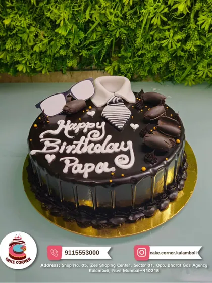 A rich chocolate truffle cake for Papa's birthday. The design is simple, with a fondant shirt collar and glasses, letting the delicious flavour be the hero.