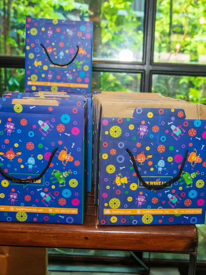 The perfect party favor. Our custom-branded goodie bags are filled with the day's creations, ensuring every child leaves with a smile and a bag full of science.