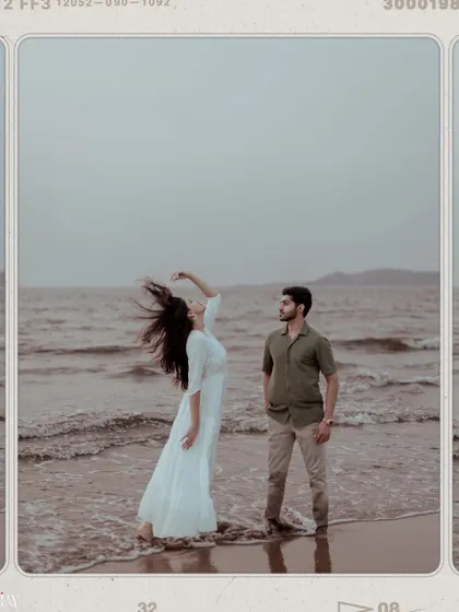 An artistic shot of the woman with her hair blowing in the wind, creating a sense of freedom and romance.